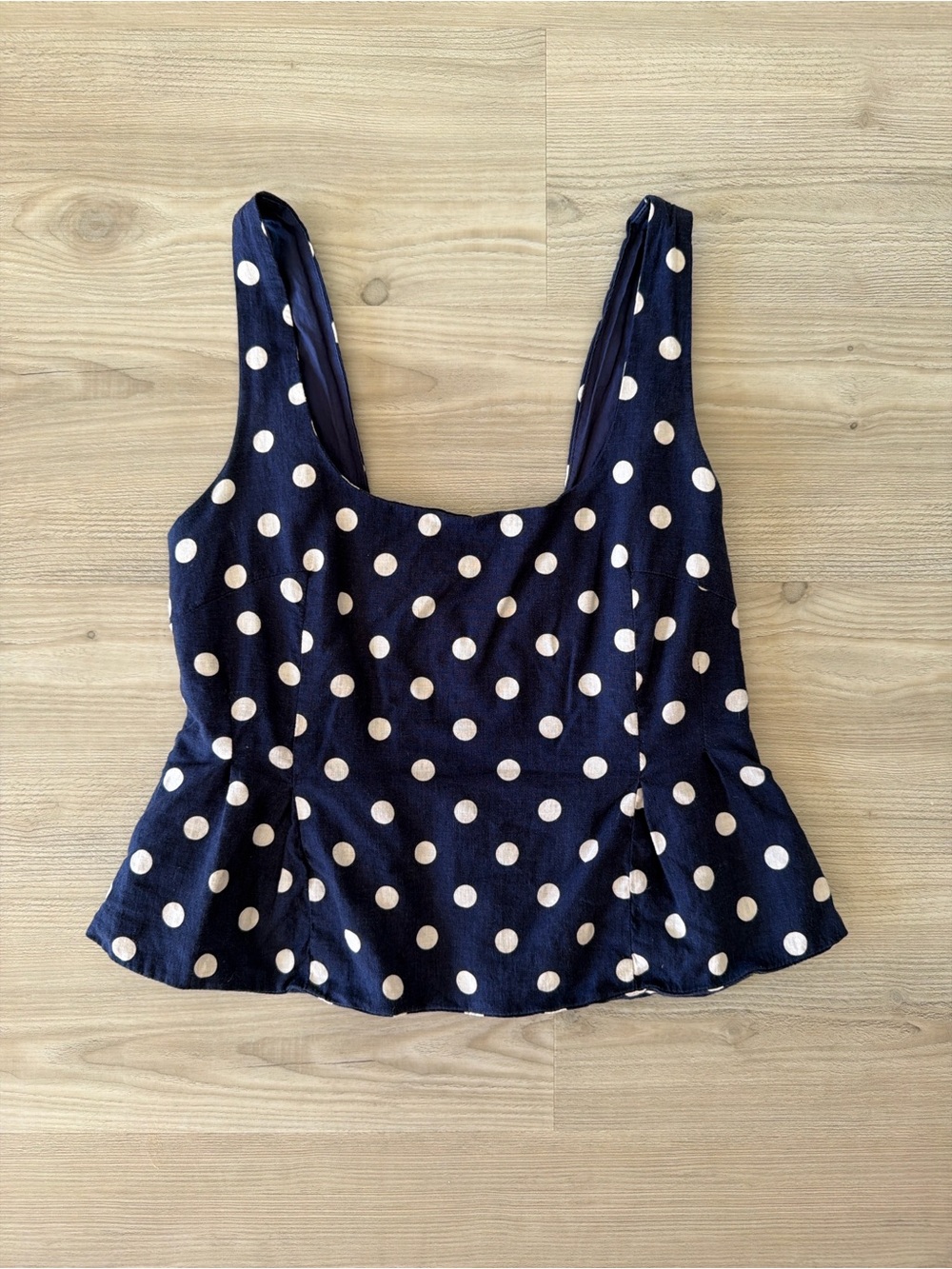 Olivaceous Navy Polka Dot Smocked Back Peplum Tank Top